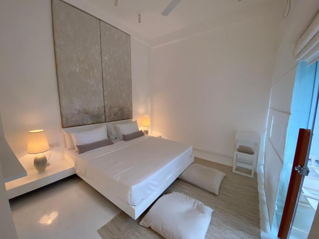 Saffron Robes Living Hotel Hikkaduwa Bagian luar foto